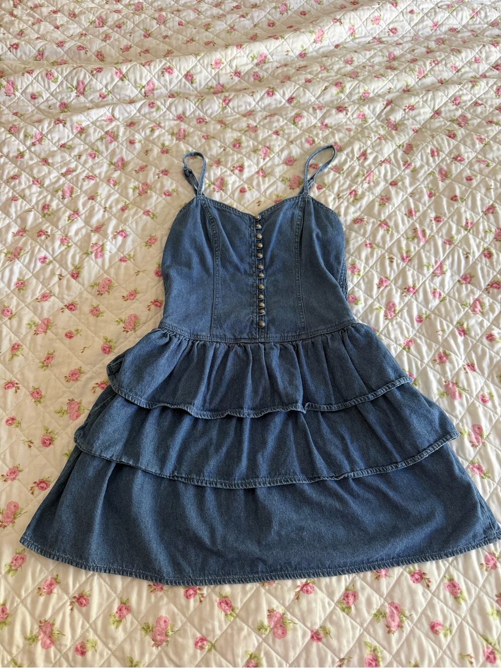 Blue denim mini dress with ruffled tiers and button-up front, size M